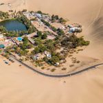 aerial photography of town in the middle of the desert